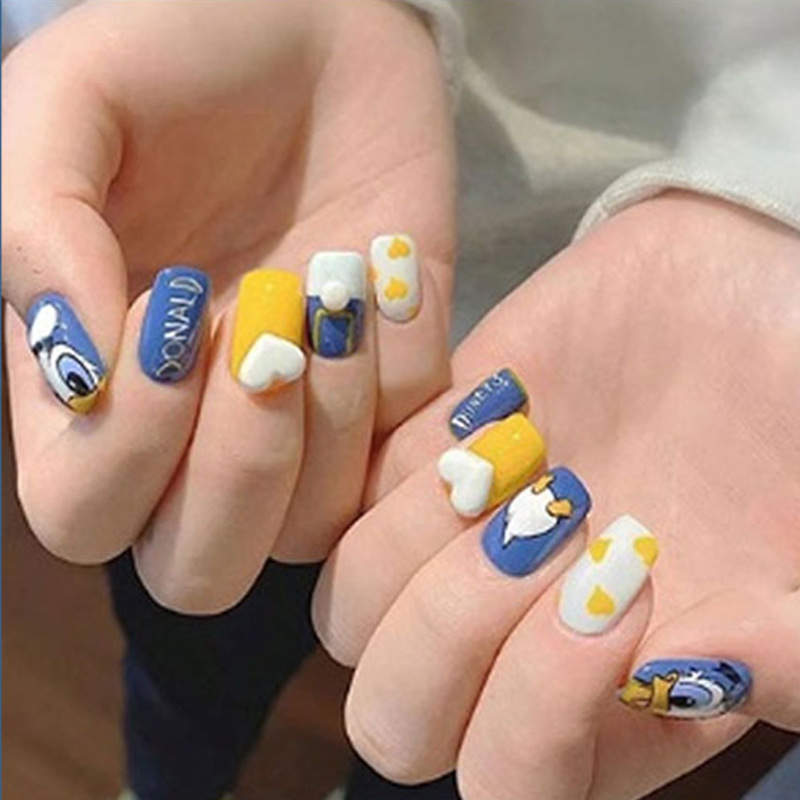 Cartoon Donald Duck Wearable Nails in Blue and Yellow Contrast Colors, Cute Hand-Painted Nail Tips, Playful Short Detachable Student Style Manicure