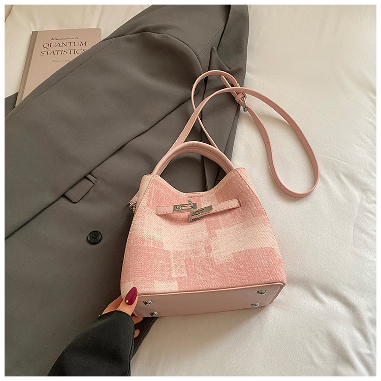 Comercio exterior transfronterizo coreano simple nicho de diseño de moda bolso de cubo para mujeres 2026 nuevo tipo de mujer mochila de hombro