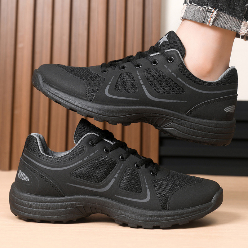 Zapatos de entrenamiento para hombre primavera y otoño al aire libre montañismo zapatos para correr malla negra transpirable y resistente al desgaste entrenamiento ultraligero zapatos casuales para hombre