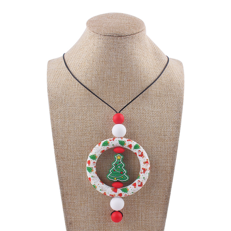 Bebé de dibujos animados de Navidad collar bebé creativo de silicona Santa Claus mordedura COLLAR COLGANTE hecho a mano