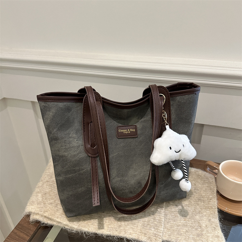 Bolso retro de gran capacidad para mujeres 2024 nueva moda textura bolso de hombro simple empalme bolso de viaje