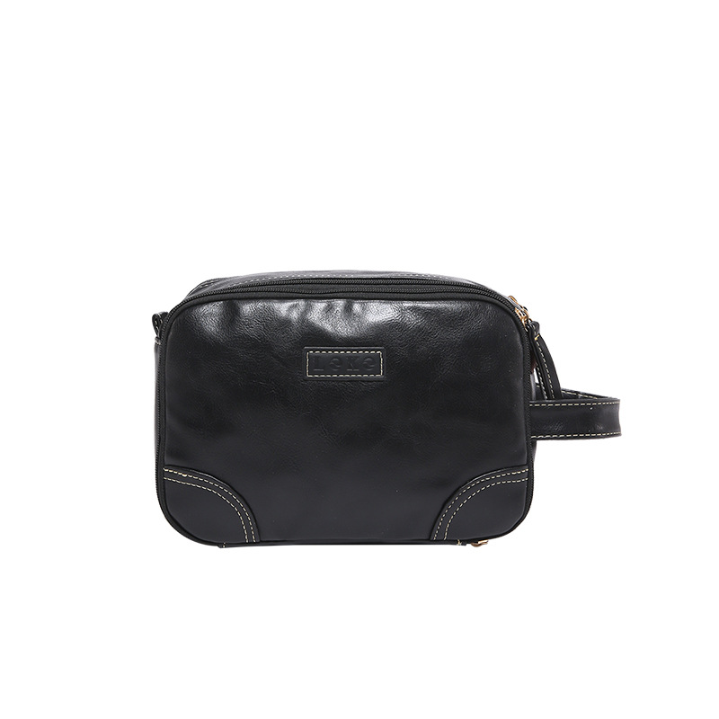 2025 nuevo paquete de lavado multicapa de gran capacidad, bolsas de maquillaje comerciales simples, bolsas de almacenamiento multifuncionales para viajes de cuero pu