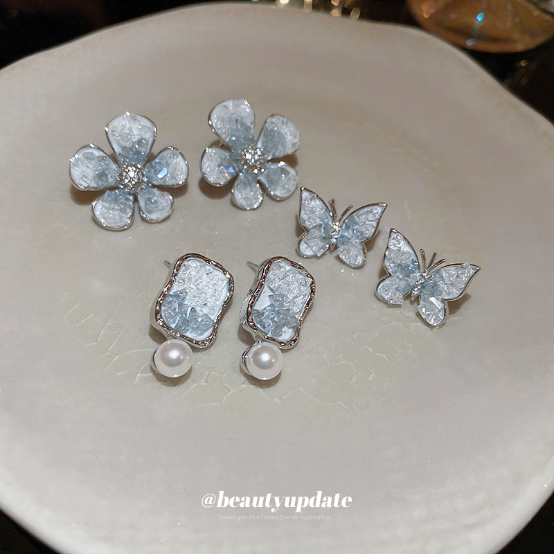 Aguja de plata pendientes de flores de cristal degradado Luz de lujo pendientes de diseño diario de cercanías pendientes de temperamento versátil al por mayor para las mujeres