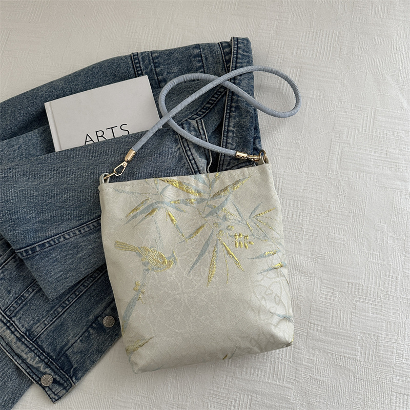 New Guofeng Jacquard canvas bolsas para mujeres 2024 verano nuevo popular bolso de hombro universal para viajar bolsas de cubo debajo de las axilas