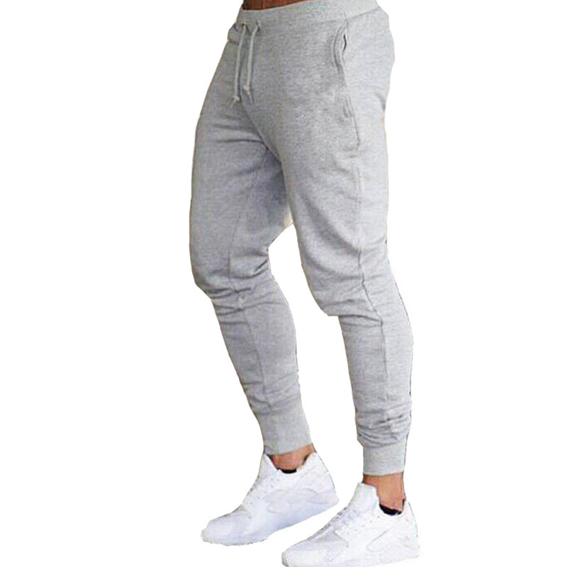 Men's spring and summer thin trousers light board ankle-tied sports pants stretch waist pencil pants slim jogging pants foreign trade
