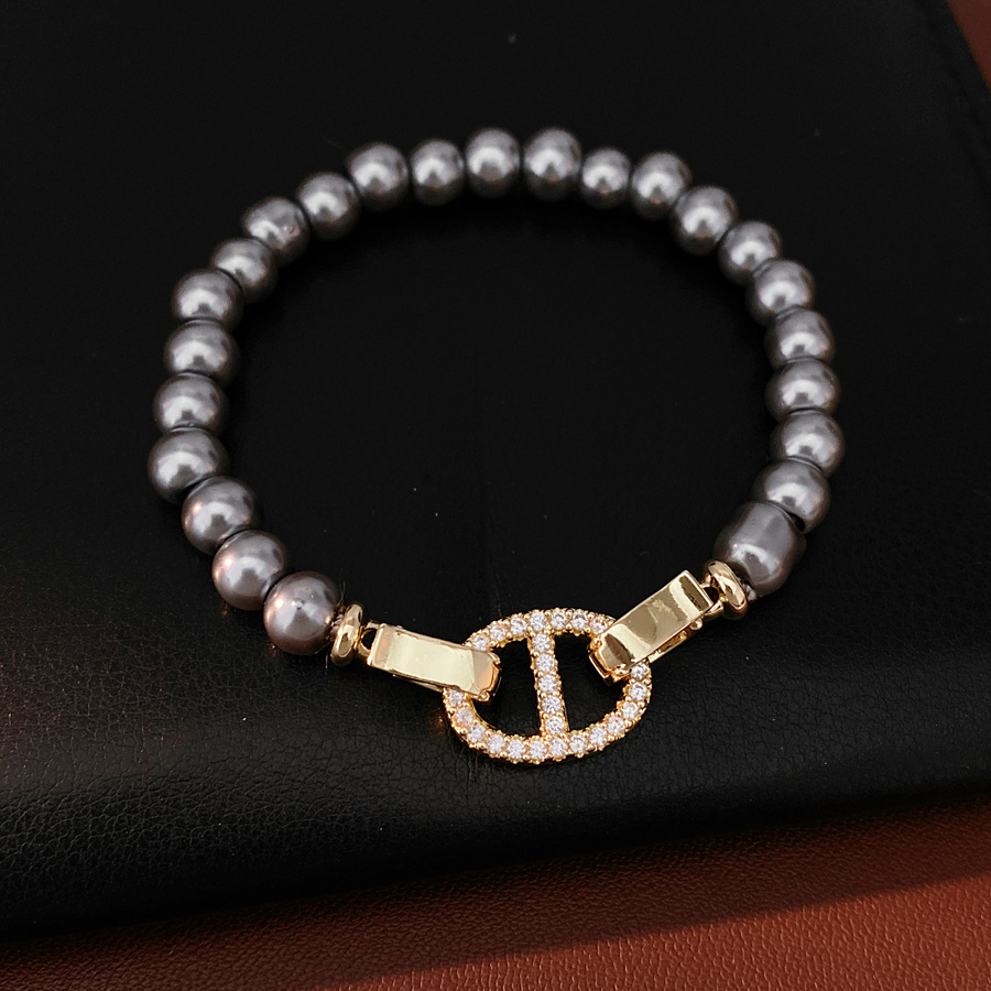 Pulsera de perla de nariz de cerdo de piedra de diamante redonda, pulsera ligera y lujosa, pulsera de nicho, joyas de moda versátiles.