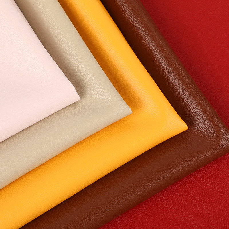 批发现货皮具面料0.6mm厚PU革皮外套皮裙 TC底饰品包装免洗人造革