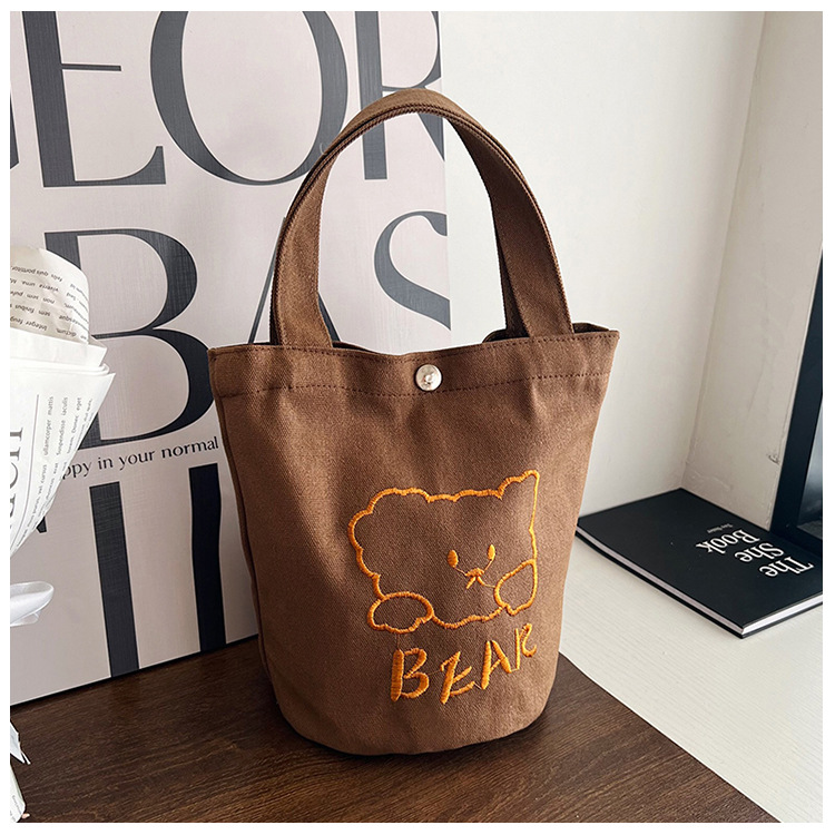 Personalized ladies' bucket bag, versatile and cute canvas bear wholesale, simple Japanese style new handbag undefined
