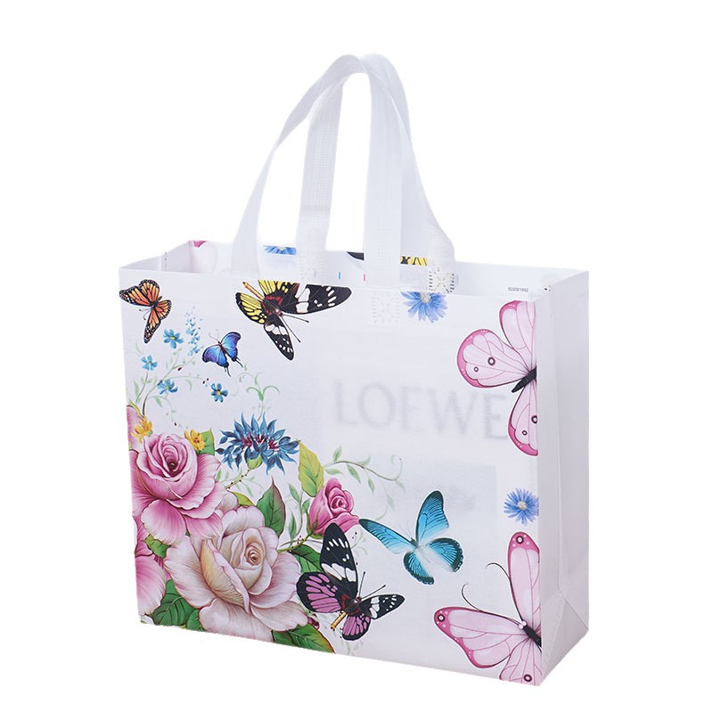 Bolsas de compras no tejidas al por mayor Bolsas de compras no tejidas recubiertas Bolsas de ropa logotipo personalizado al por mayor
