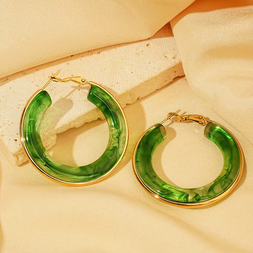 Сет earrings? The original: "Retro brand earrings stainless steel, European style, gradient"