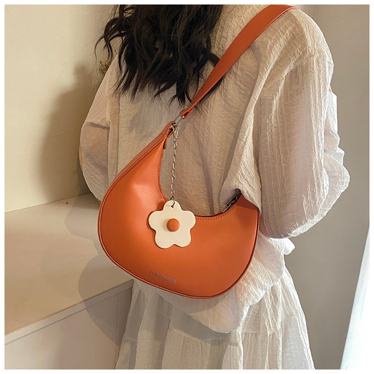 Cross-border women's bag 2024 New style, trendy texture, versatile, ins fashion single-shoulder armpit bag, small flower pendant, crescent moon bag undefined