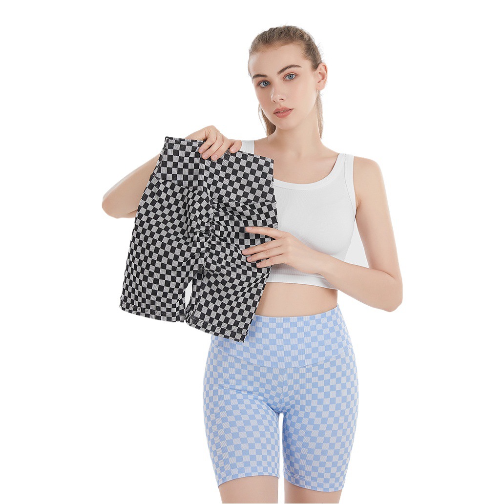 Pantalones de Yoga de pata de gallo de punto sin costuras europeos y americanos pantalones cortos ajustados de secado rápido de Deportes de cadera de melocotón plisado de mujer