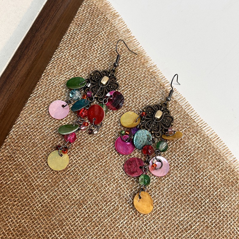 Pendientes de borla de concha geométrica redonda, estilo de vacaciones junto al mar, gancho para la oreja, pendientes de todo fósforo de moda, sentido de clase alta de nicho