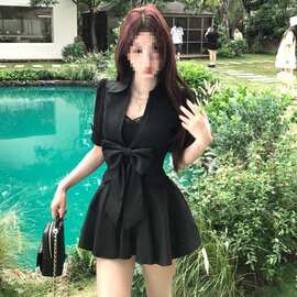黑色拼接压皱polo领泡泡袖连衣裙女夏季御姐风蝴蝶结收腰A字短裙