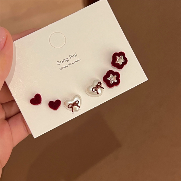 Demi-season earrings with bow