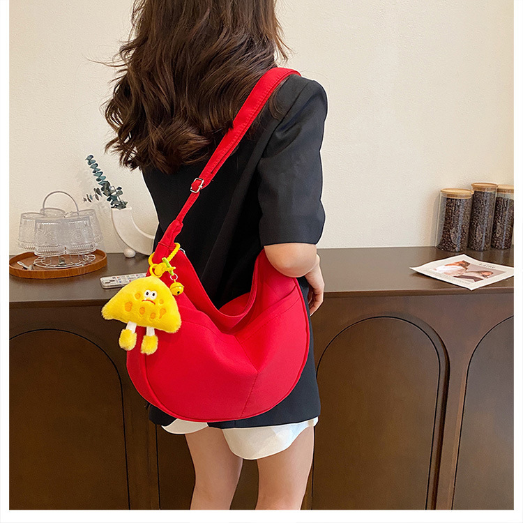 Simple solid-color canvas bag 2024 new style Japanese large-capacity single-shoulder dumpling bag, versatile for school and commuting crossbody bag undefined