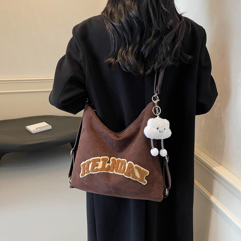 Mochila de gamuza transfronteriza 2024 otoño e invierno nuevo bolso femenino de gran capacidad