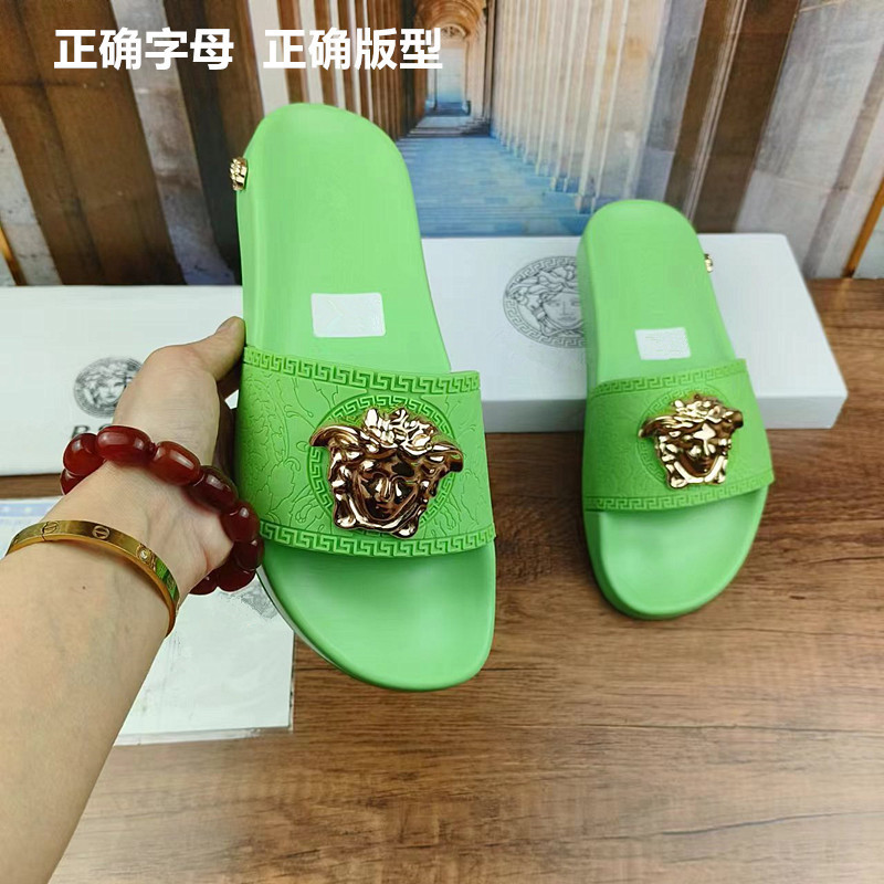 Guangzhou factory a generation of women's slippers wear summer new metal beauty head flat green one-word slippers