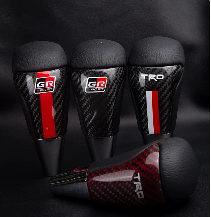 Car modification carbon fiber gear head universal leather automatic shift lever handball wave stick head gear shift handle head