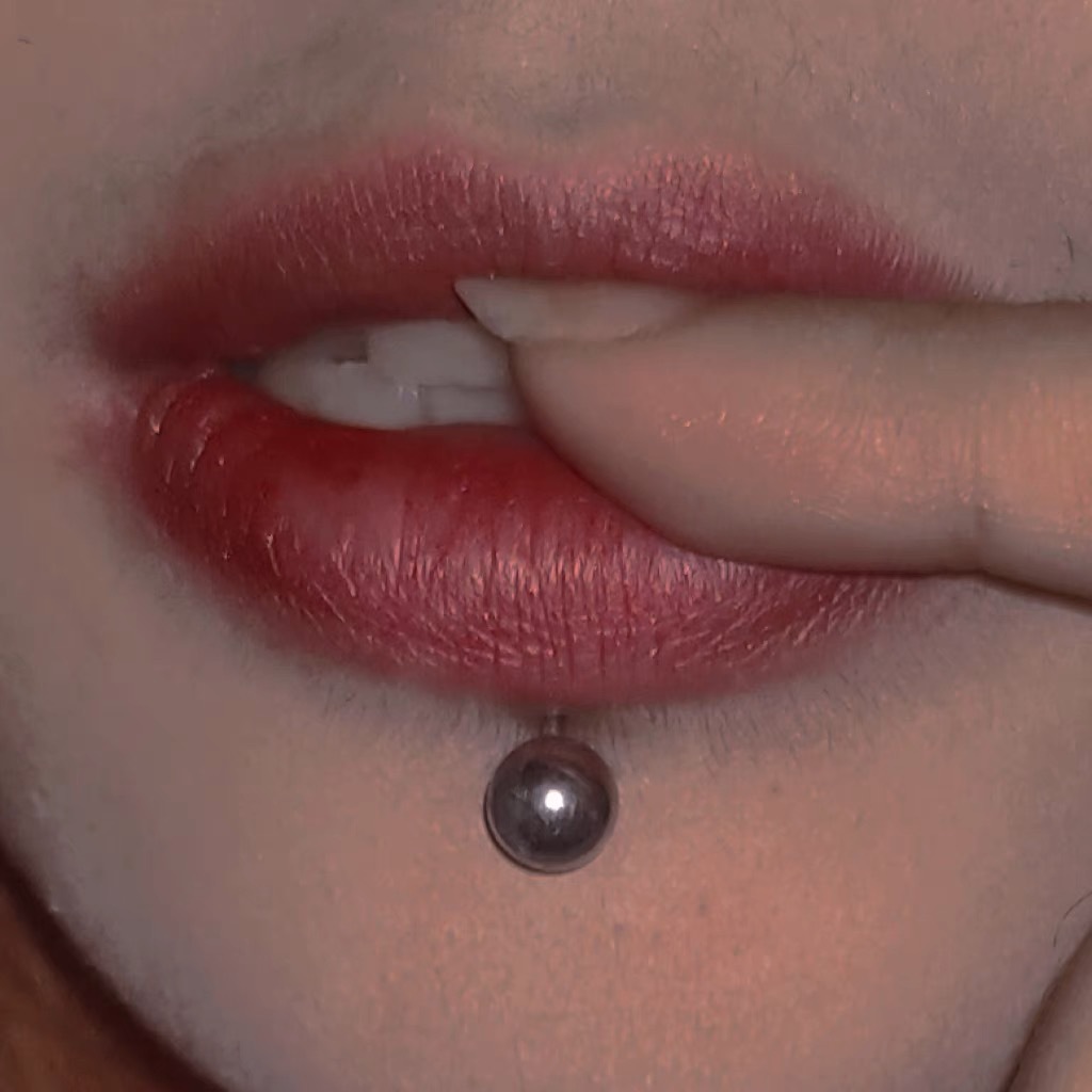 Labret stud lip piercing jewelry styling detail