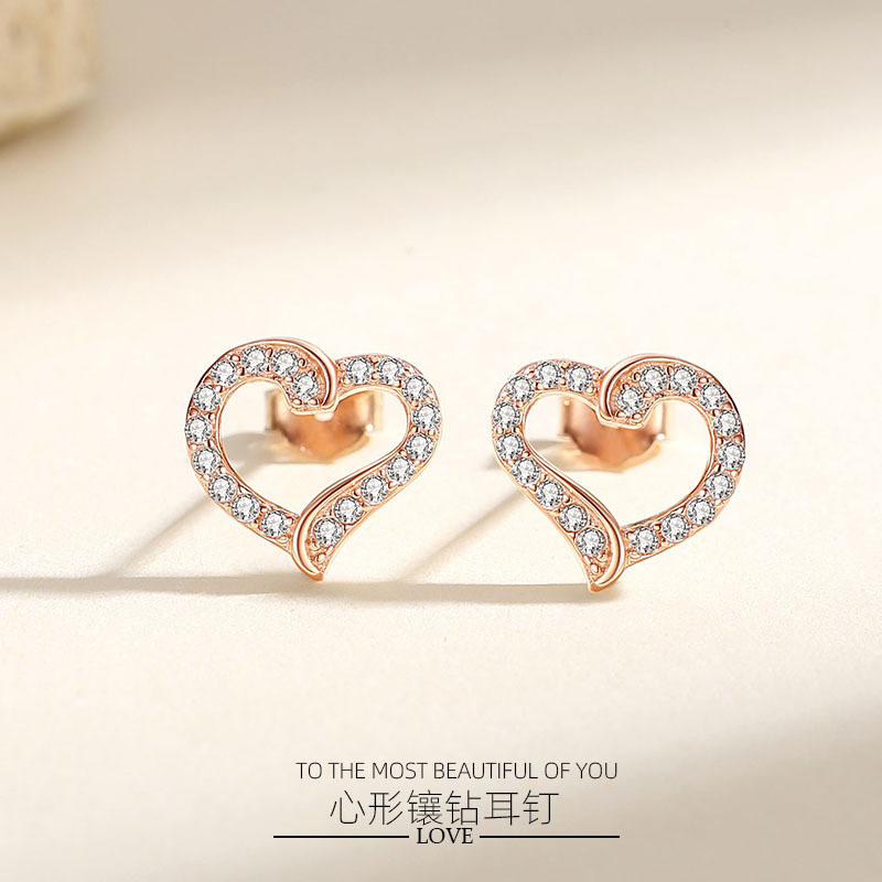 Estilo de lujo ligero incrustado en diamantes en forma de corazón pendientes llenos de diamantes aretes de moda japonesa y coreana aretes de Plata de Ley 925 nicho amor pendientes de mujer