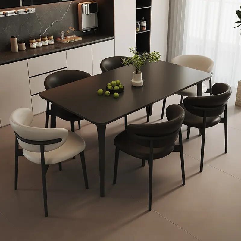 Italian-style dining table with rock slab top, simple black modern light luxury dining table and chair set, rectangular, suitable for small apartments