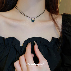黒い二重の蝶のネックレスのギャルの甘いクールな風の個性のデザイン感の鎖の鎖の小さい大衆の百合の首の鎖の女性の卸売り