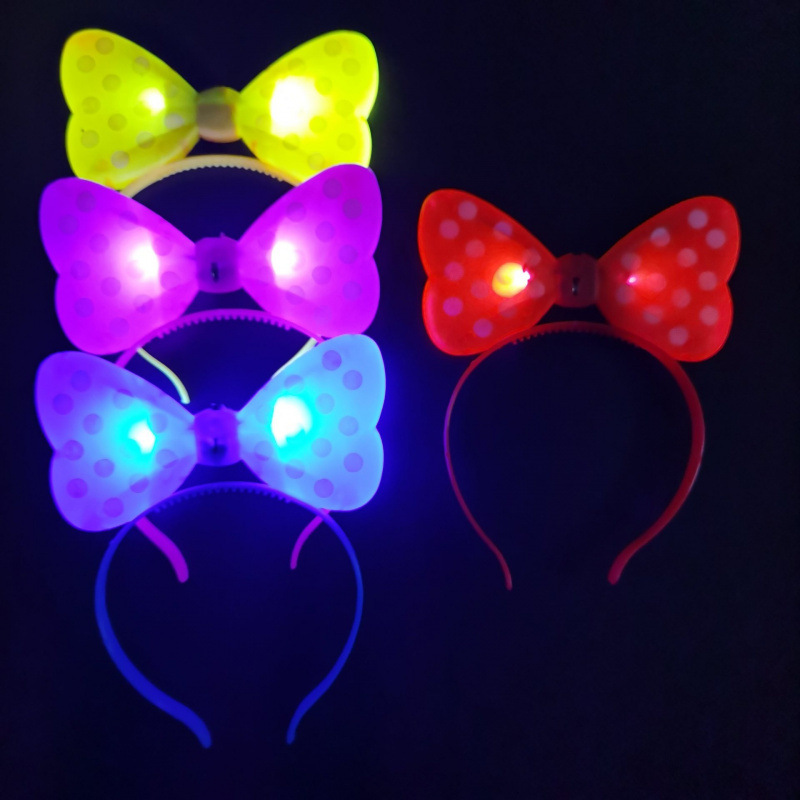 Lazo naranja y aro para el cabello