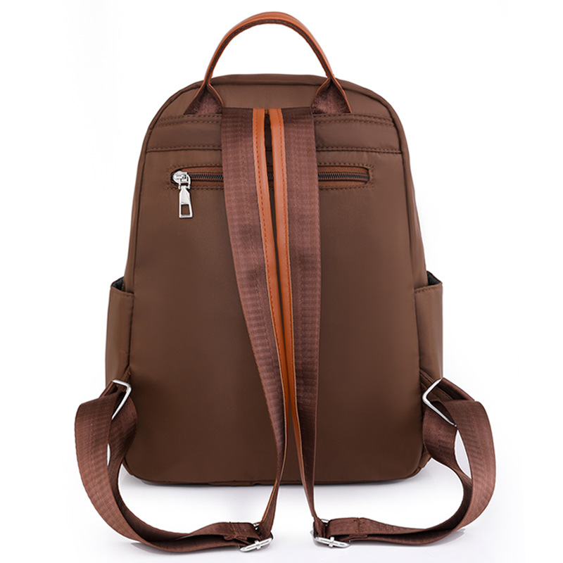 Bolsos para mujer 2023 nueva mochila casual para mujer de nailon moda todo fósforo color de contraste mochila ligera mochila escolar al por mayor