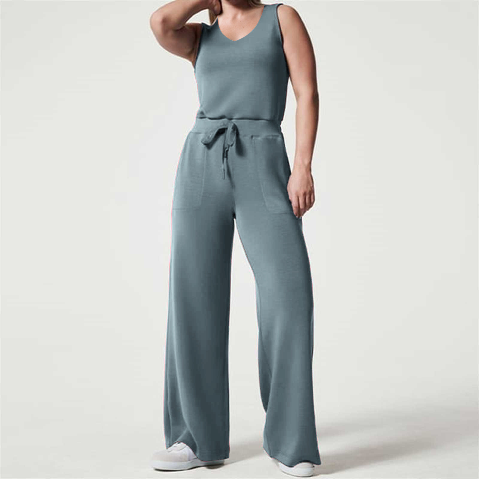 2023 primavera y verano nuevo versátil moda europea y americana adelgazamiento ocasional de las mujeres sin mangas color sólido V-cuello pantalones jumpsuit