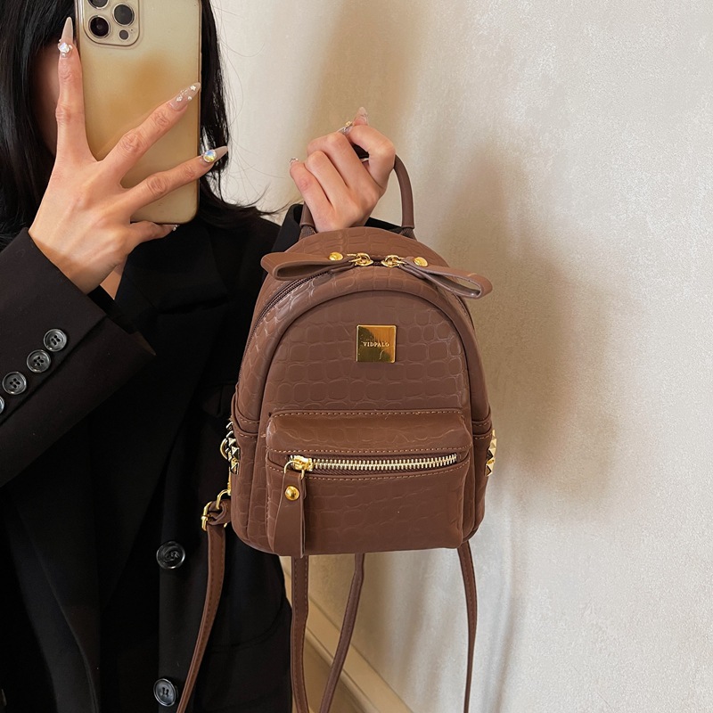 2025 nuevo comercio exterior bolsas de mujer estilo coreano popular piedra mochila de mujer mochila de viaje ligera