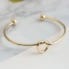 S236 Love knotted bracelet golden