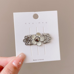 Pantalones de jeans de cintura, botones de cintura ajustados, botones ajustables fijos