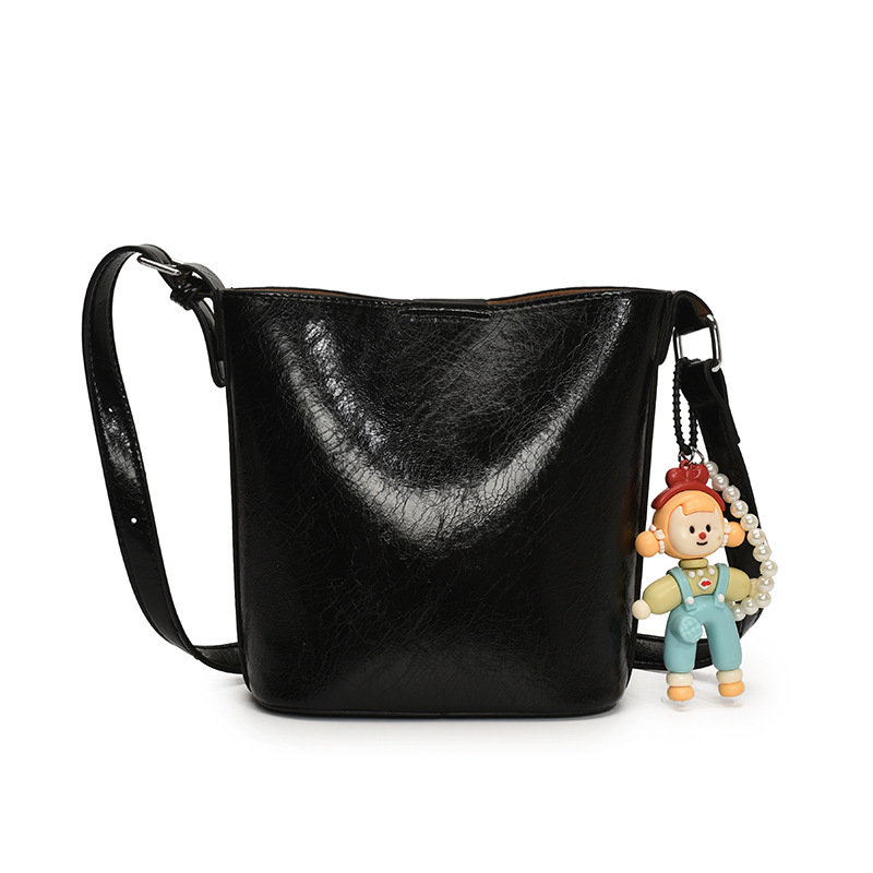 Bolso de cubo de tendencia simple y de alto nivel para mujer 2025 nuevo bolso de hombro casual de moda bolso de mensajero de cercanías