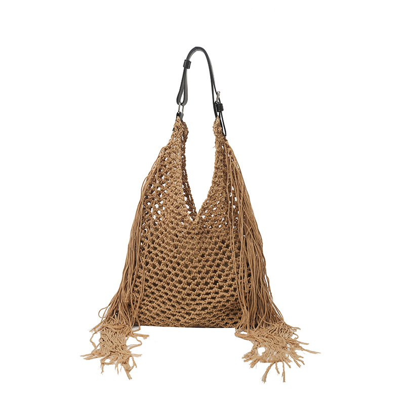 Bolso retro con borlas Bolso tejido a mano hueco femenino Bolso de playa Nuevo viajero Bolso Tote salvaje de un solo hombro para mujer