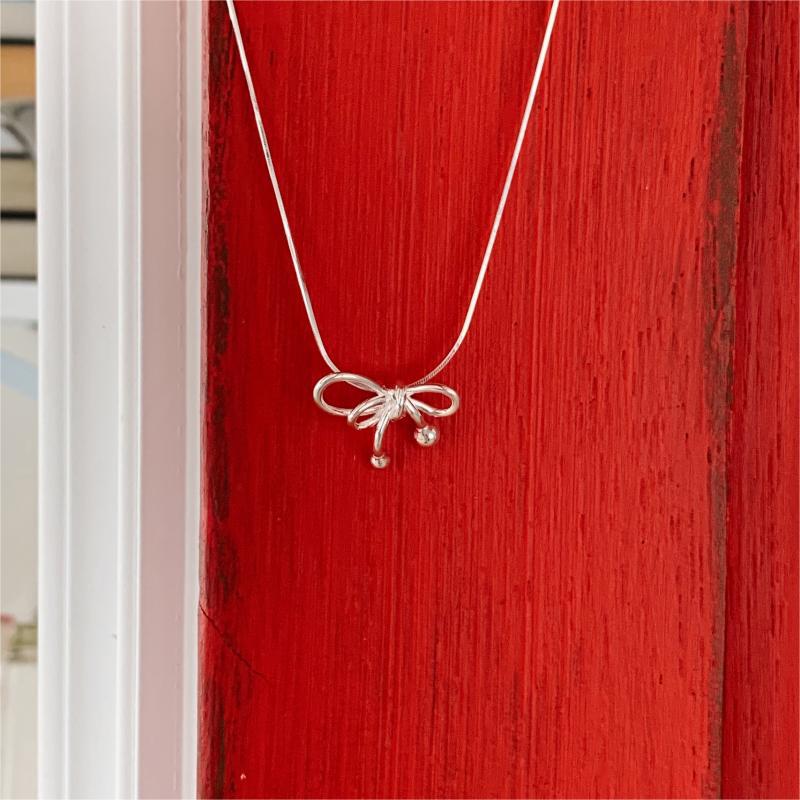 Simple Style Bow Knot Sterling Silver Plating Pendant Necklace display picture 5