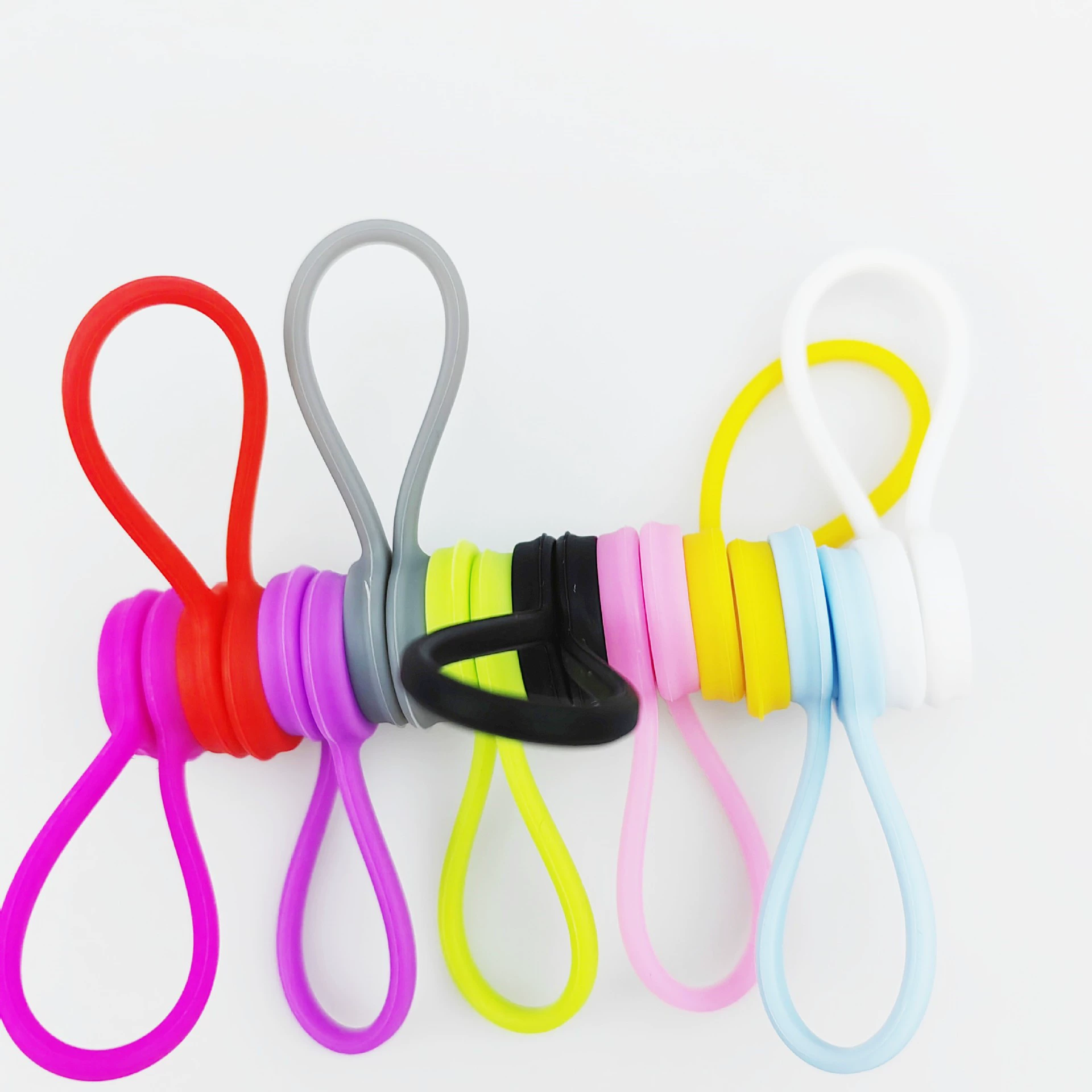 The headset magnetic winding wire charging cable header wire thread multi -purpose strong magnetic data cable storage device