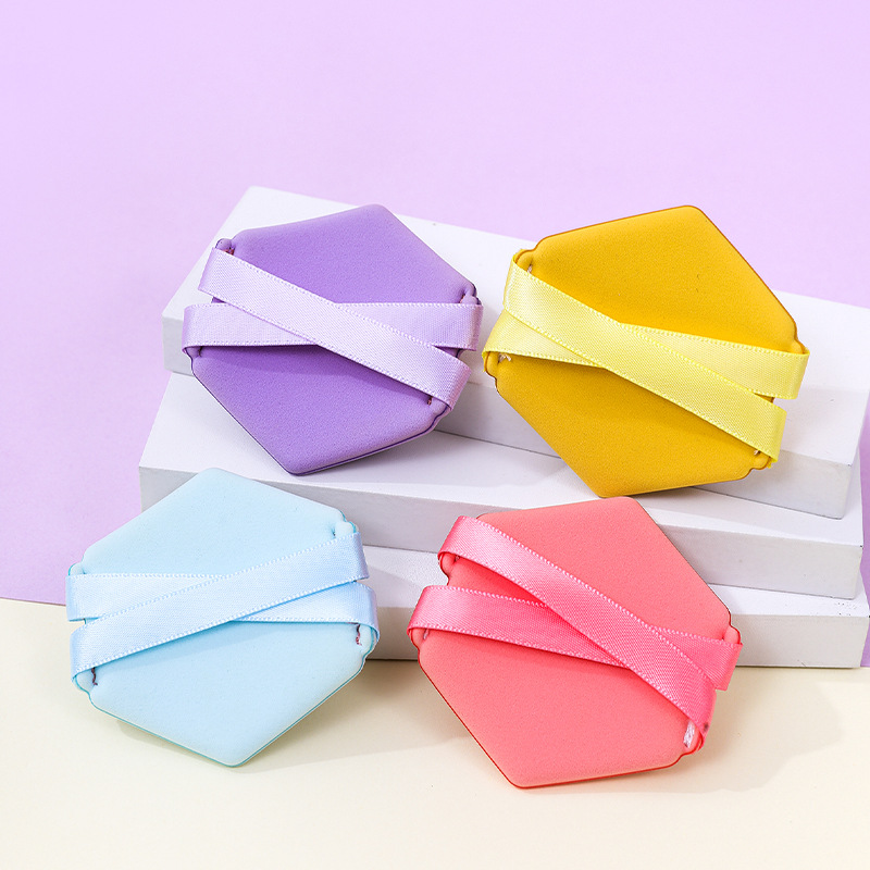 La borla de polvo de doble cinta personalizada de fábrica no come polvo, se agranda en el agua, cojín de esponja de maquillaje sin látex de diamante hexagonal