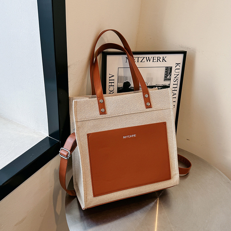 Bolso portátil de lona personalizado para mujer nueva tendencia con logotipo impreso en color casual bolso de mensajero de viaje de negocios