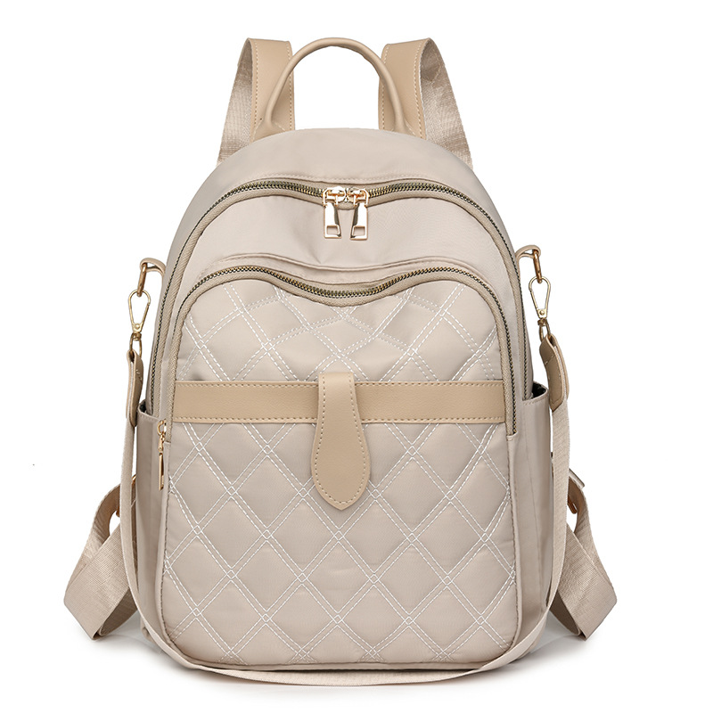 Mochila para mujer 2024 nueva mochila de viaje de ocio de nailon de la moda coreana de todo fósforo