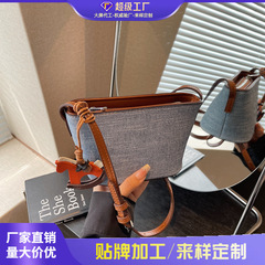 外贸撞色小众包包女2025新款复古百搭斜挎包高级感超火手提水桶包