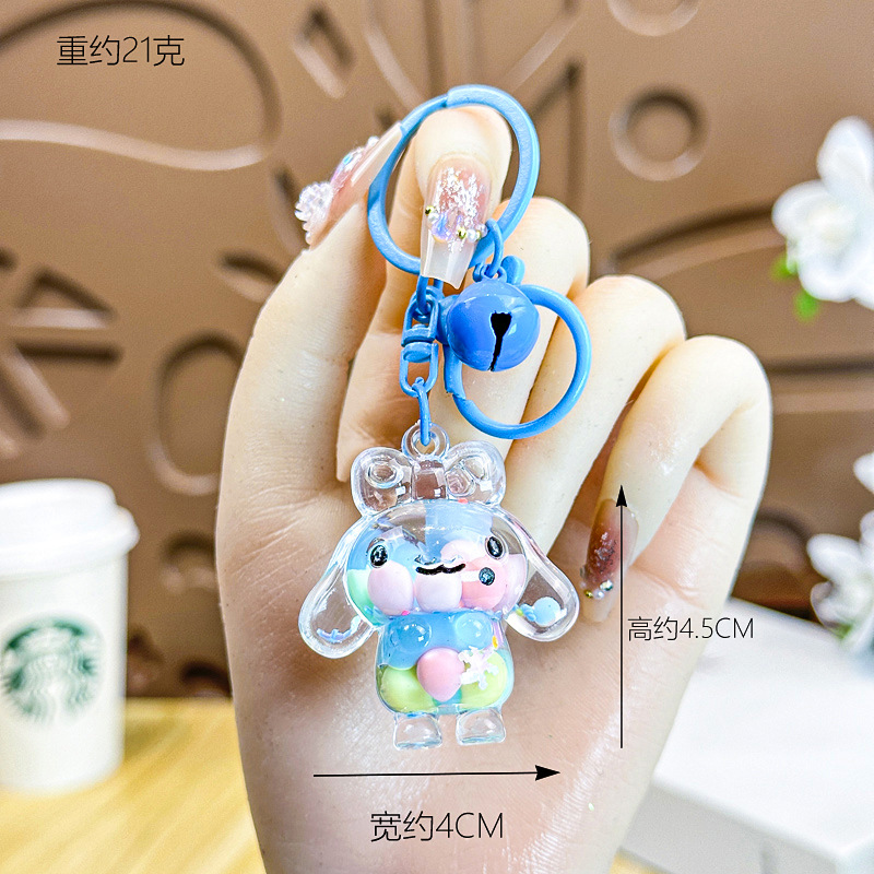 Caricatura creativa adorable acrílico frijoles de azúcar fluir arena jade Gui perro llavero colgante adornos puestos de productos al por mayor