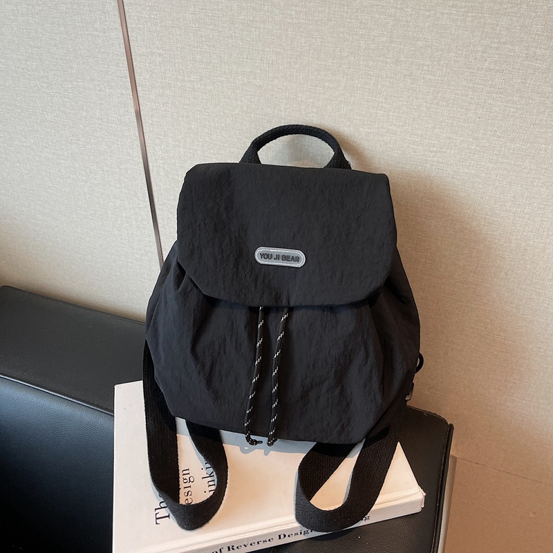 Mochila de moda pequeña mochila casual para mujeres 2025 nueva bolsa de viaje de gran capacidad bolsa de viaje al aire libre