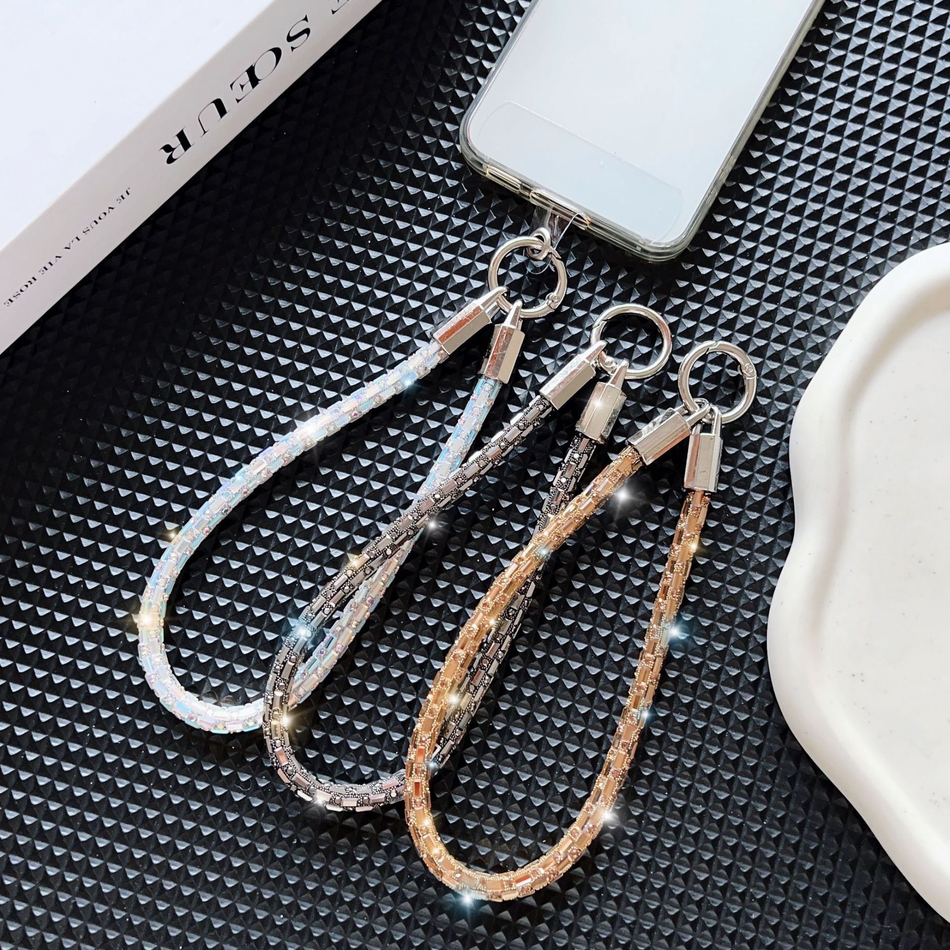 Nuevo cordón de teléfono móvil de cristal cuadrado de lujo de alta gama, cadena de mano de moda anti-pérdida y anti-caída, cuerda corta de muñeca