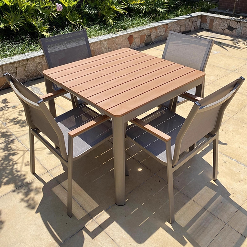 Mesa y silla de madera de plástico al aire libre patio al aire libre jardín terraza balcón a prueba de lluvia y protección solar combinación de mesa y silla de aleación de aluminio