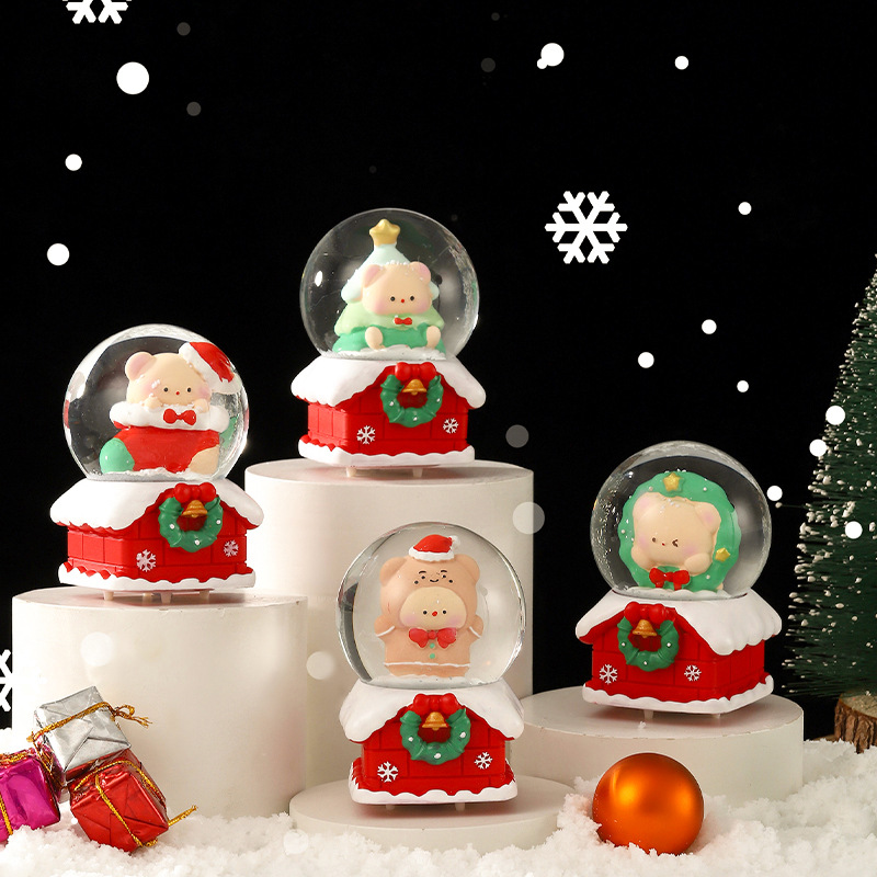 Una variedad de regalos de decoración de Navidad Navidad iluminante bola de cristal caja de música ventana diseño de velas lámparas de viento árbol de Navidad