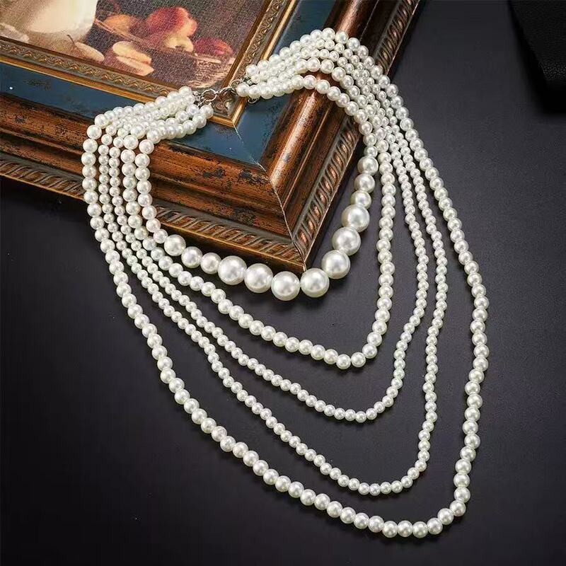 European and American fashion multi-layer pearl sweater chain lady simple Joker long necklace pendant jewelry wholesale