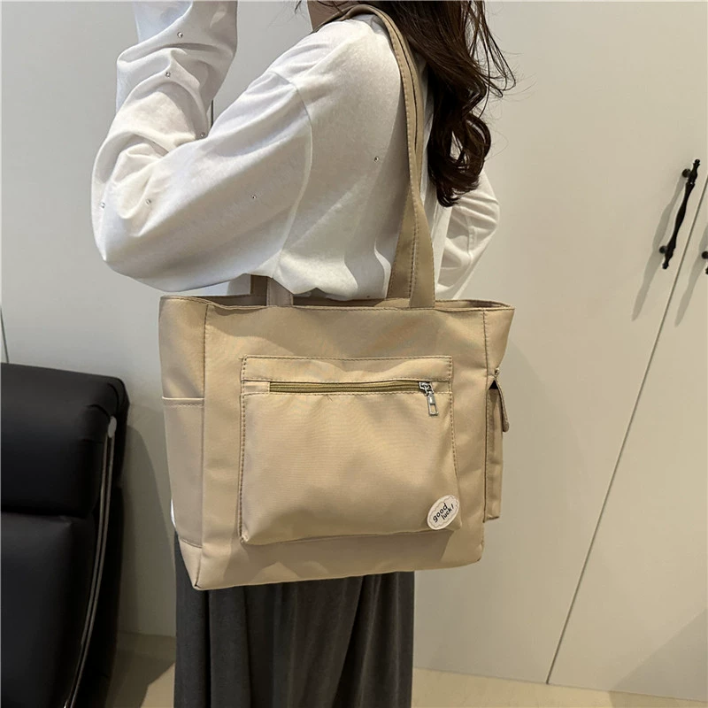 Capacious shopping bag, fashionable laptop for elementary school students, one-shoulder bag, city style