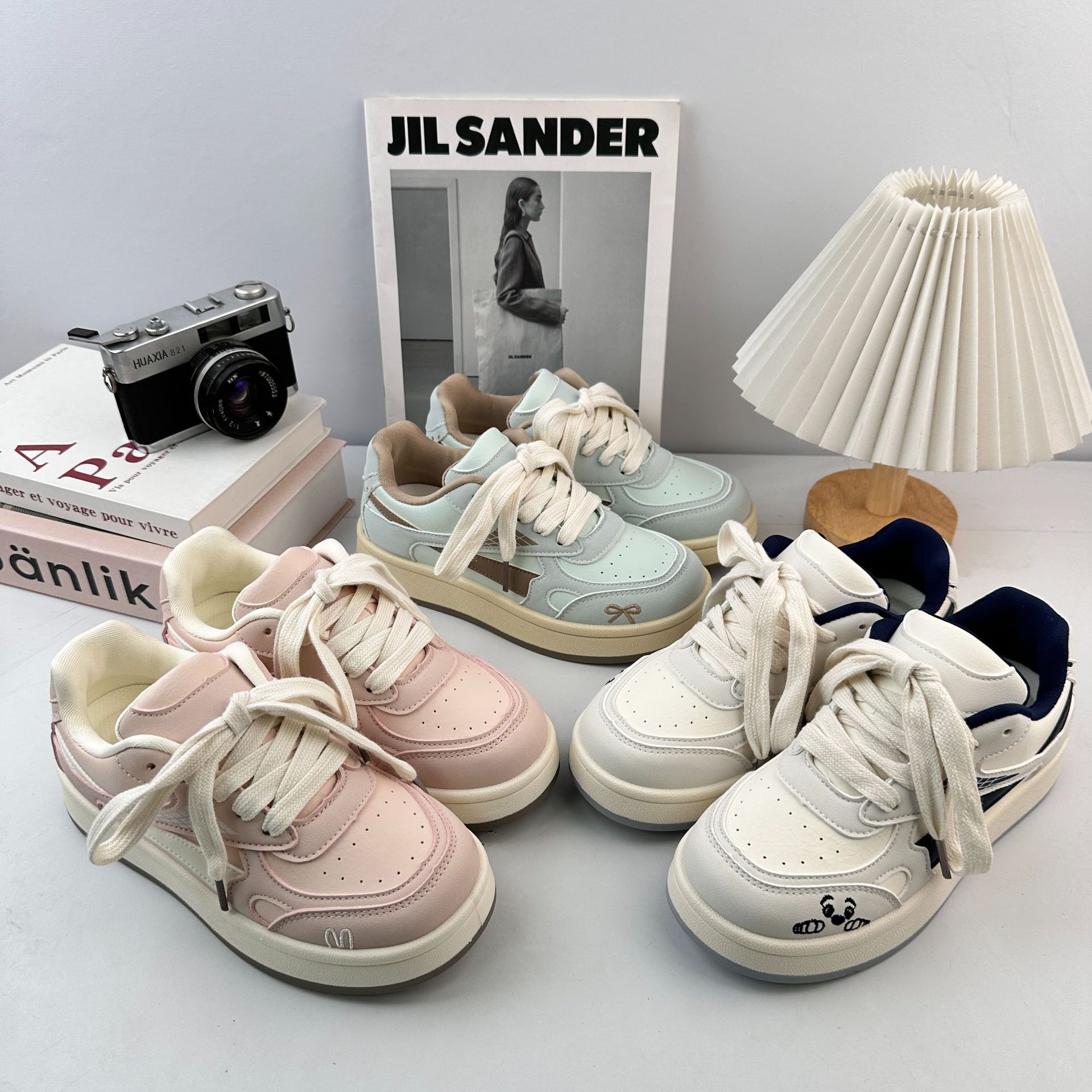 Yuanbo coreano rosa versátil zapatos de skate para mujeres 2025 otoño nuevos estudiantes zapatos deportivos casuales zapatos de entrenamiento alemán pequeños zapatos blancos