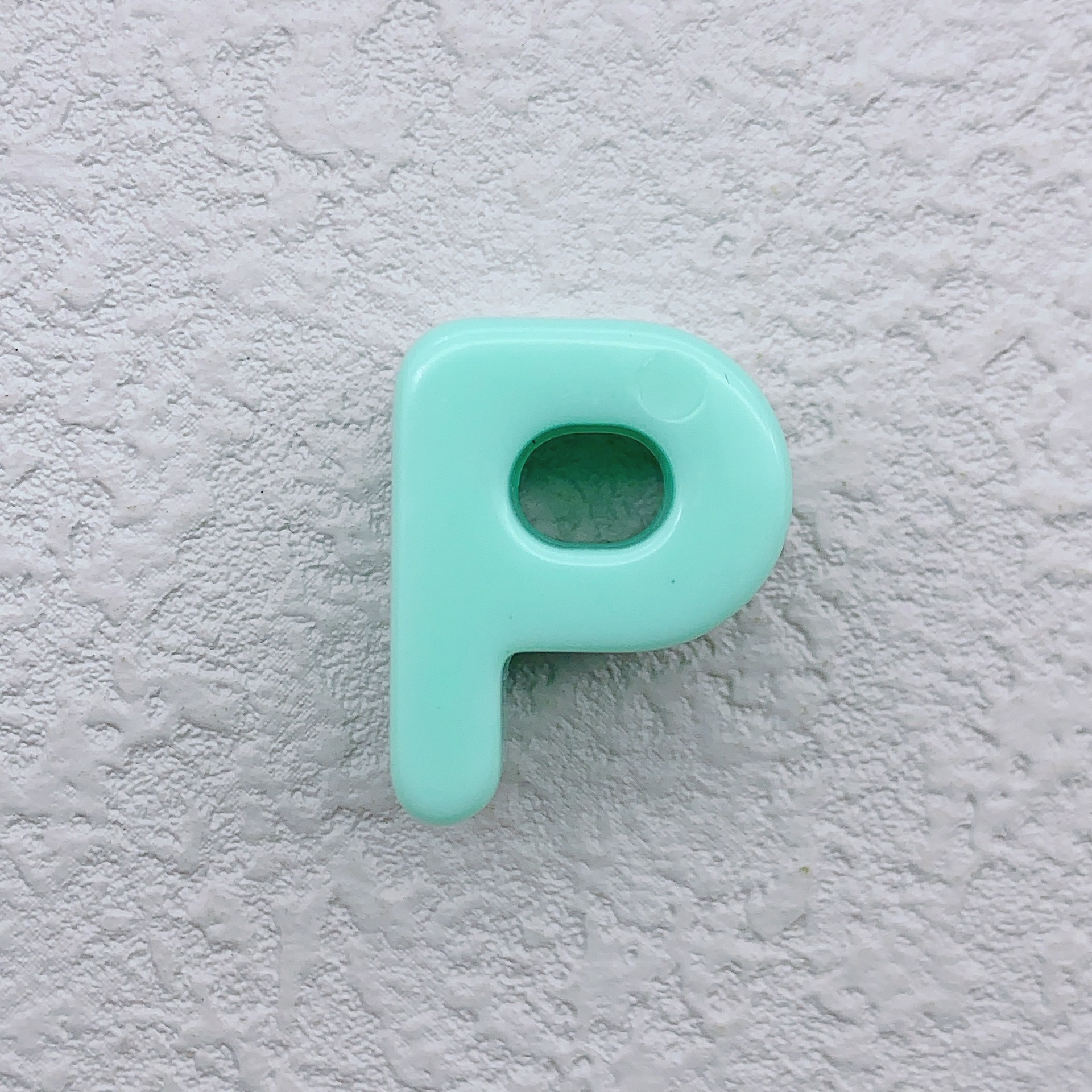 P (turquoise)